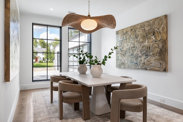 dining area with light hardwood / wood-style flooring