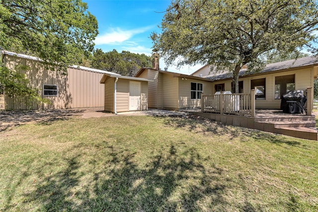 view of yard with a wooden deck