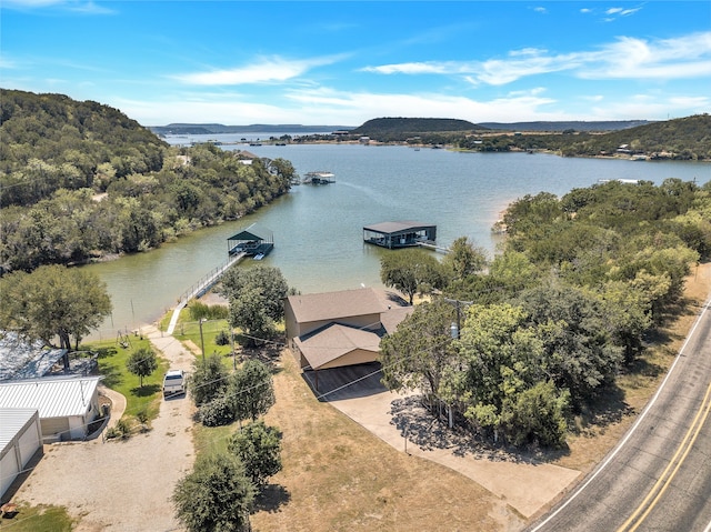 birds eye view of property featuring a water view