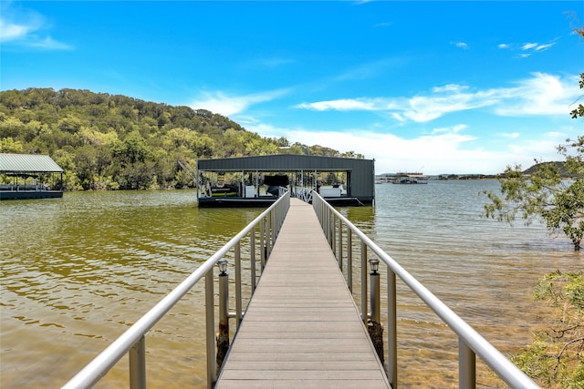 view of dock featuring a water view