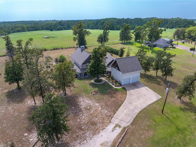 birds eye view of property featuring a rural view