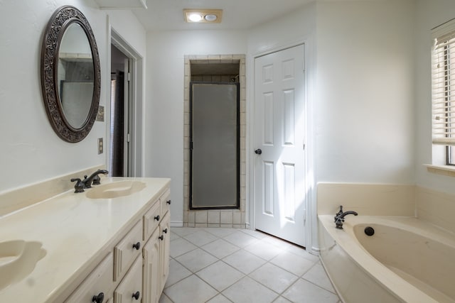 bathroom with shower with separate bathtub, tile patterned flooring, and vanity