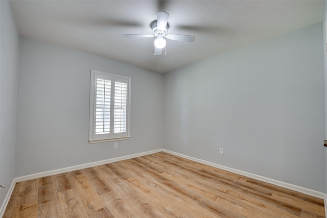 unfurnished room featuring ceiling fan and light wood-type flooring