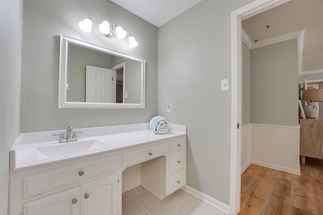 bathroom featuring vanity and wood-type flooring