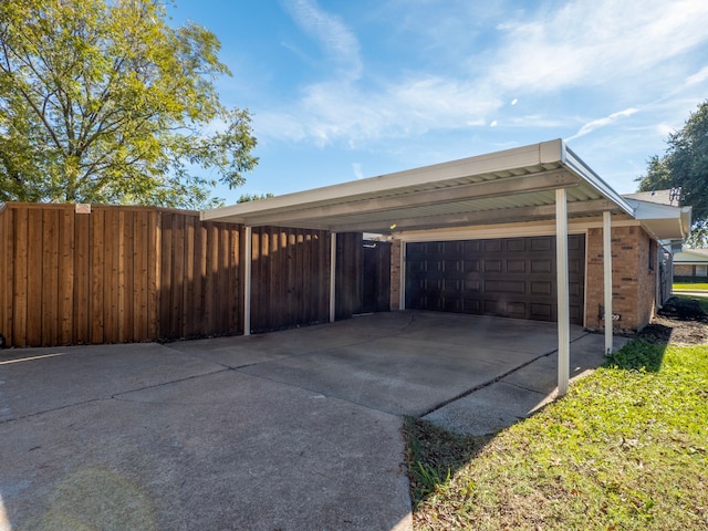 view of vehicle parking featuring a carport