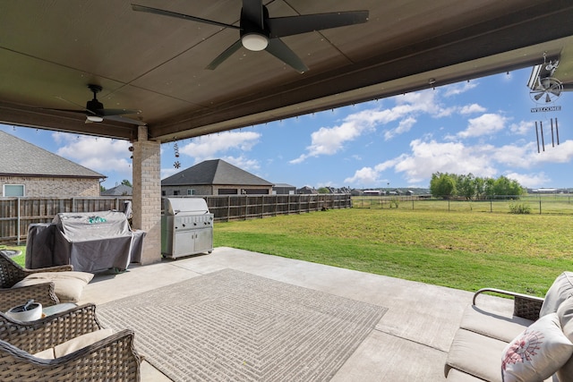 view of patio featuring grilling area and ceiling fan