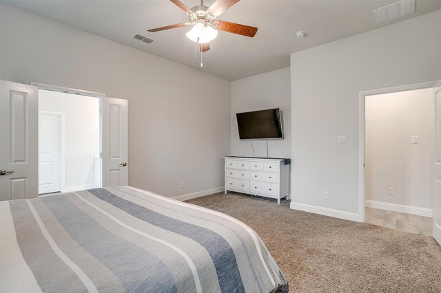 bedroom with light carpet and ceiling fan