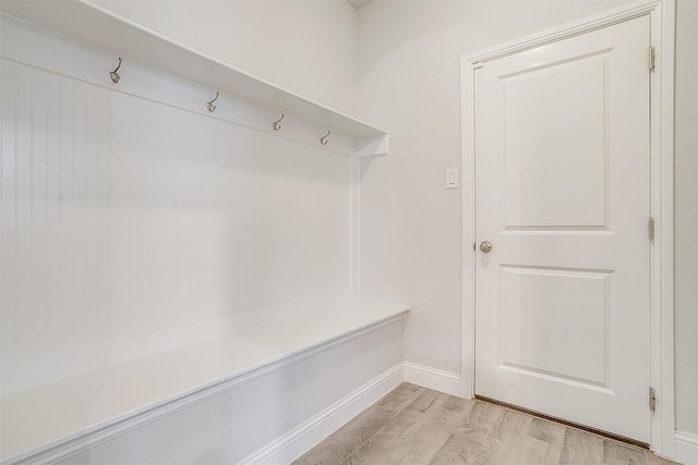 mudroom with light hardwood / wood-style flooring