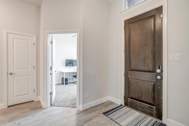 entrance foyer with light wood-type flooring