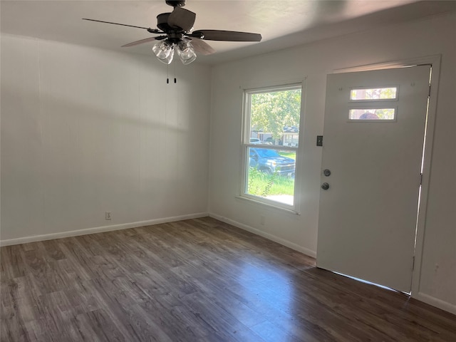 entrance foyer with dark wood-type flooring and ceiling fan