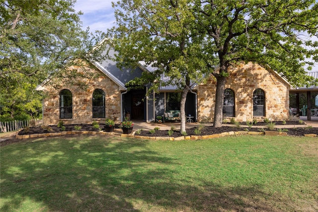 view of front of home with a front yard