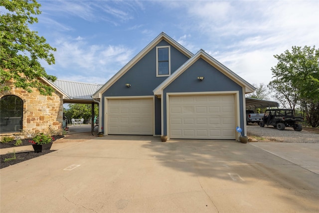 garage with a carport