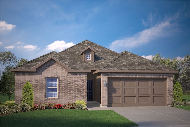 front facade featuring a garage and a front yard