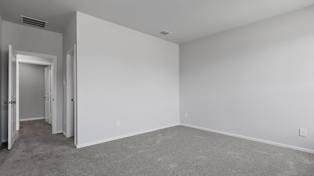 unfurnished room featuring carpet flooring