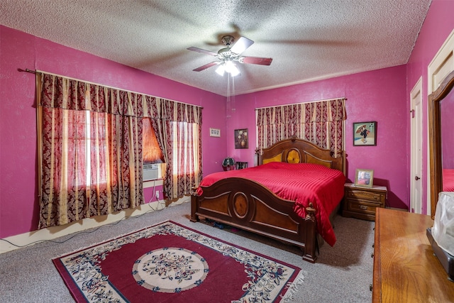 bedroom featuring a textured ceiling, carpet floors, ceiling fan, and cooling unit