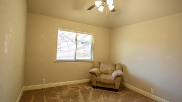 living area with ceiling fan and carpet floors