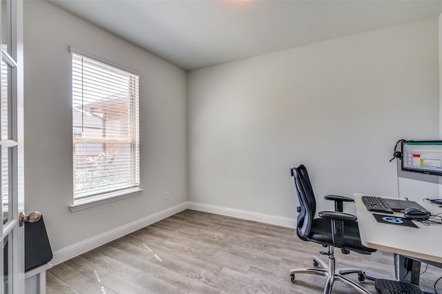 office space featuring light wood-type flooring