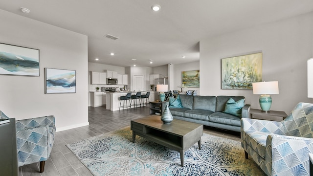 living room featuring light wood-type flooring