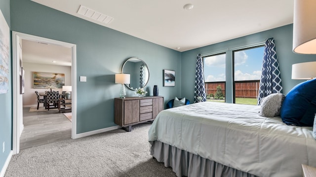 bedroom featuring wood-type flooring