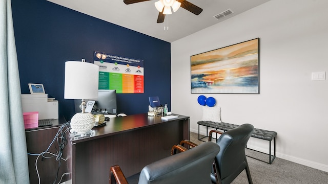 home office with carpet floors and ceiling fan