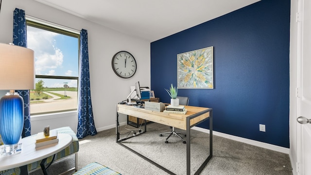 carpeted home office featuring plenty of natural light