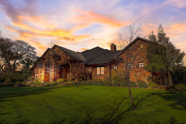 view of front of home featuring a yard