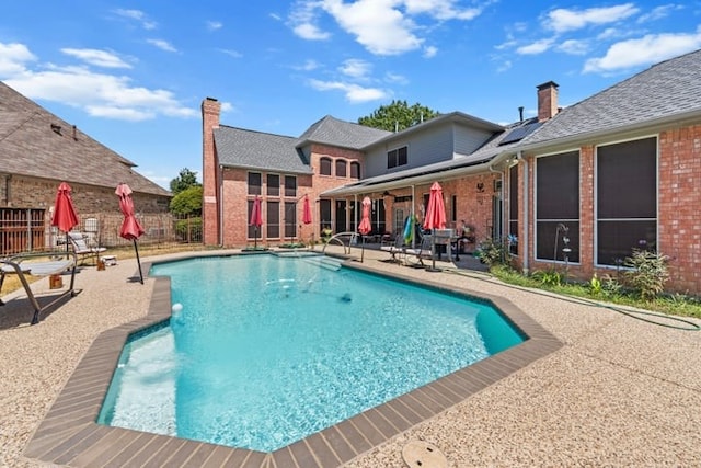 view of pool featuring a patio area