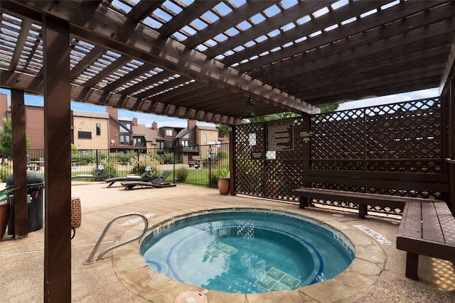 view of pool with a pergola, a patio, and a community hot tub