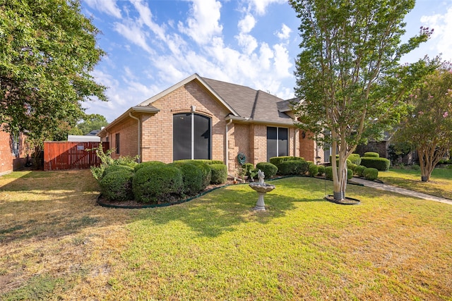 view of front of house featuring a front lawn