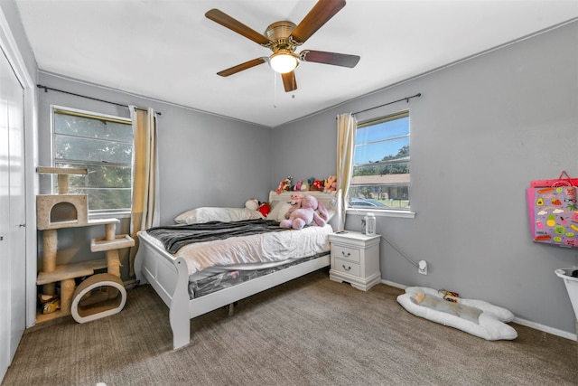 carpeted bedroom with ceiling fan