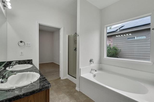 bathroom with plus walk in shower and vanity