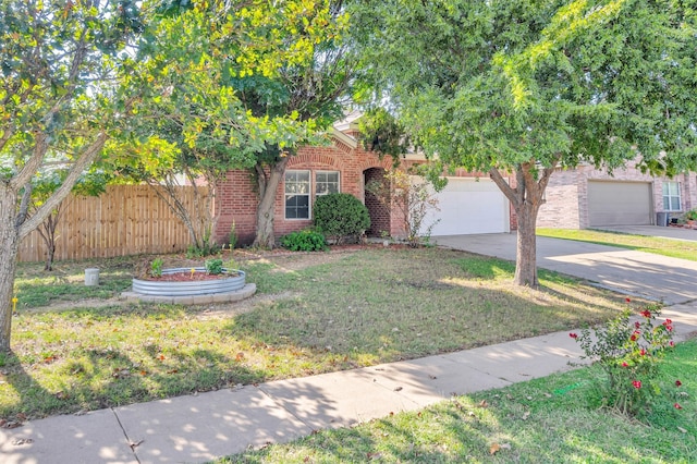 view of property hidden behind natural elements with a front lawn