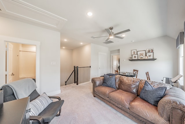 carpeted living room featuring ceiling fan