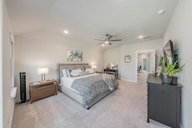 carpeted bedroom featuring ceiling fan and vaulted ceiling