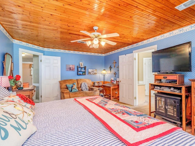 bedroom featuring light carpet, wallpapered walls, wood ceiling, and visible vents