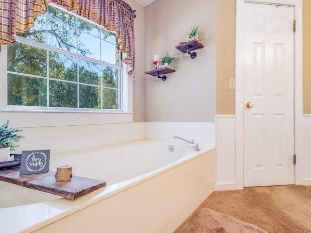 bathroom featuring a garden tub