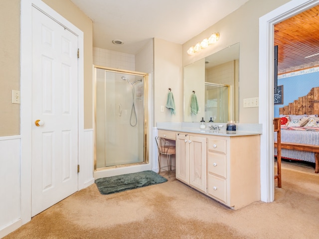 bathroom featuring vanity and walk in shower