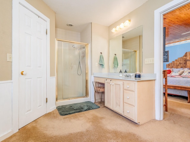 ensuite bathroom featuring ensuite bath, carpet flooring, vanity, and a shower stall