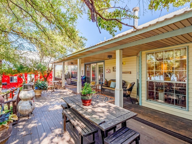 deck with outdoor dining space