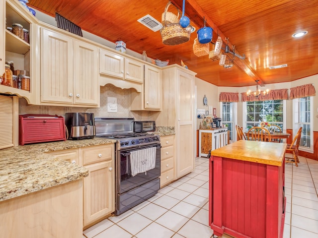 kitchen with decorative backsplash, light tile patterned floors, wooden ceiling, and gas stove