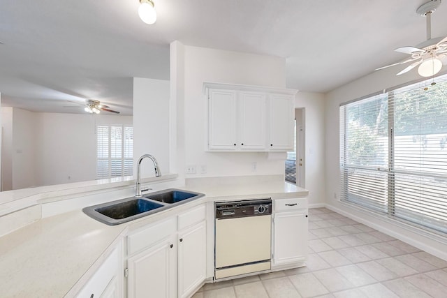 kitchen with ceiling fan, light tile patterned floors, white dishwasher, and a healthy amount of sunlight