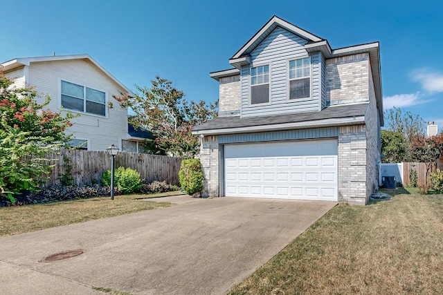 view of front facade featuring a front lawn and a garage