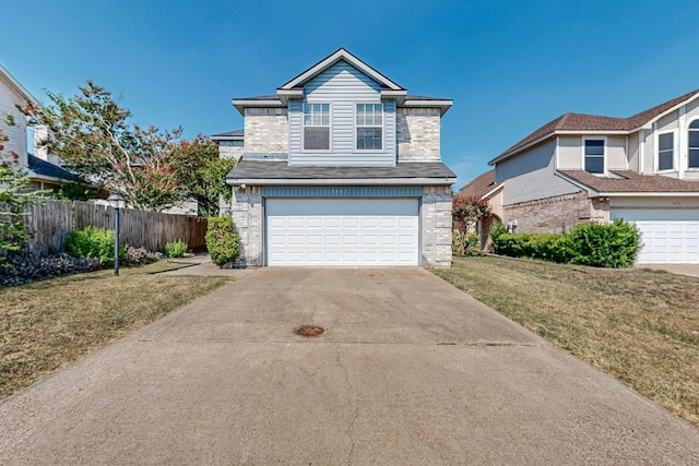 front of property with a garage and a front yard