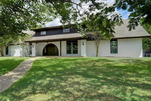 view of front of home with a front yard