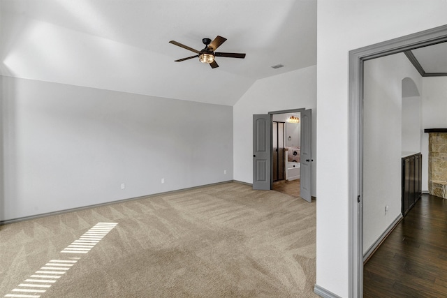 unfurnished room with carpet floors, ceiling fan, and lofted ceiling