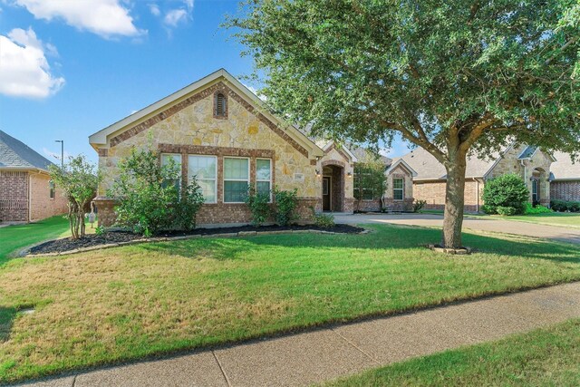 view of front of home with a front yard