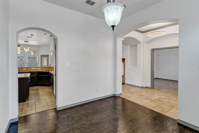 spare room with light wood-type flooring