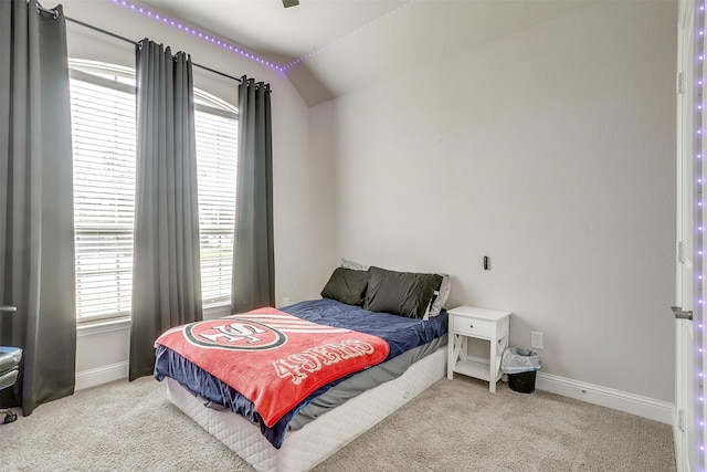 bedroom featuring light carpet