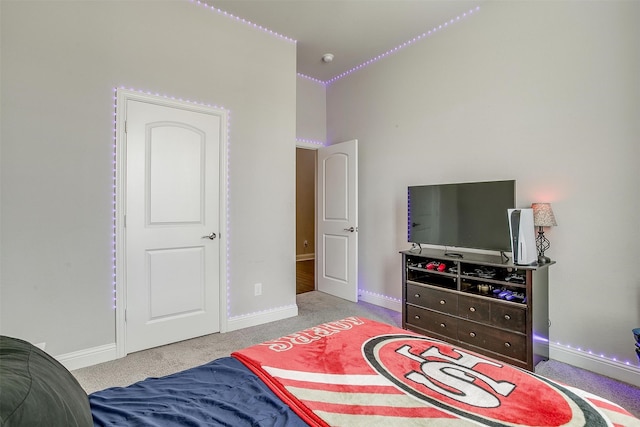 bedroom with light carpet