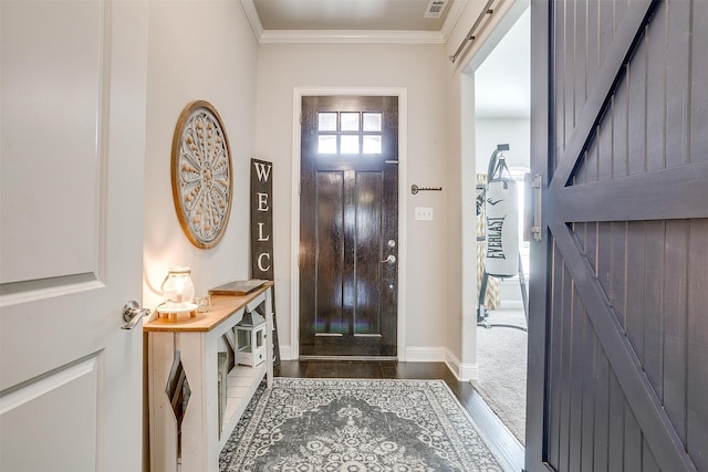 entrance foyer featuring crown molding and hardwood / wood-style floors